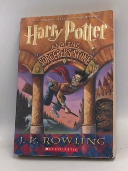 Harry Potter and the Sorcerer's Stone - J. K. Rowling
