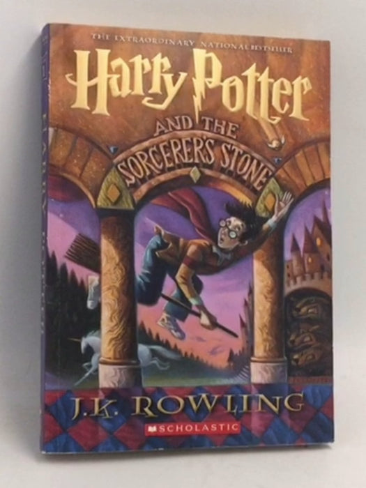 Harry Potter and the Sorcerer's Stone - J. K. Rowling