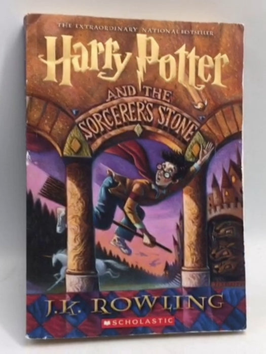 Harry Potter and the Sorcerer's Stone - J. K. Rowling