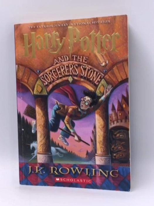 Harry Potter and the Sorcerer's Stone - J. K. Rowling