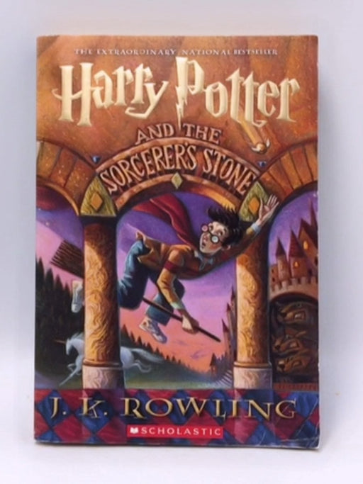 Harry Potter and the Sorcerer's Stone - J. K. Rowling