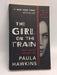 The Girl on the Train  - Paula Hawkins; 