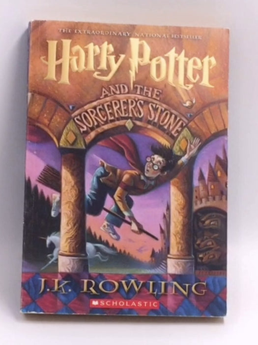 Harry Potter and the Sorcerer's Stone - J. K. Rowling