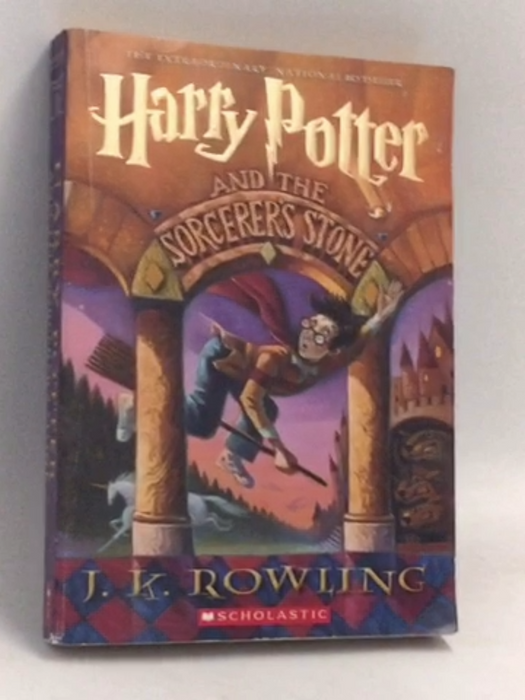 Harry Potter and the Sorcerer's Stone - J. K. Rowling