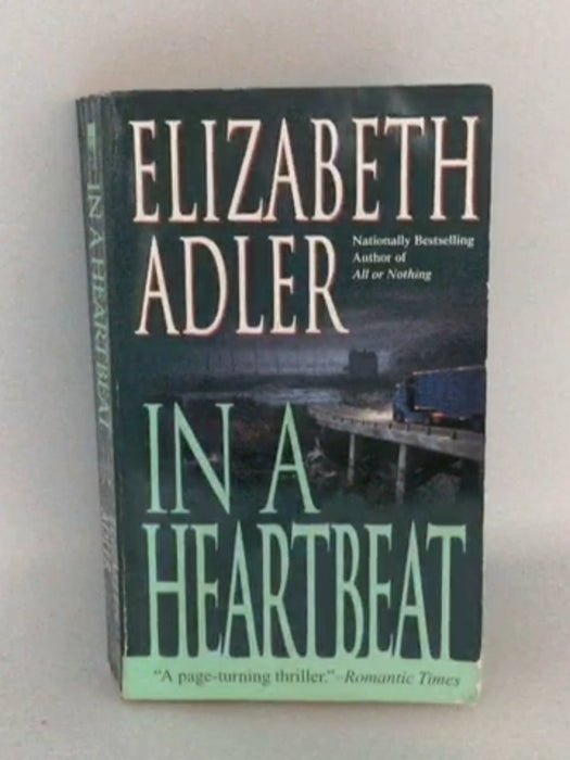 In a Heartbeat - Elizabeth Adler; 