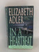In a Heartbeat - Elizabeth Adler; 